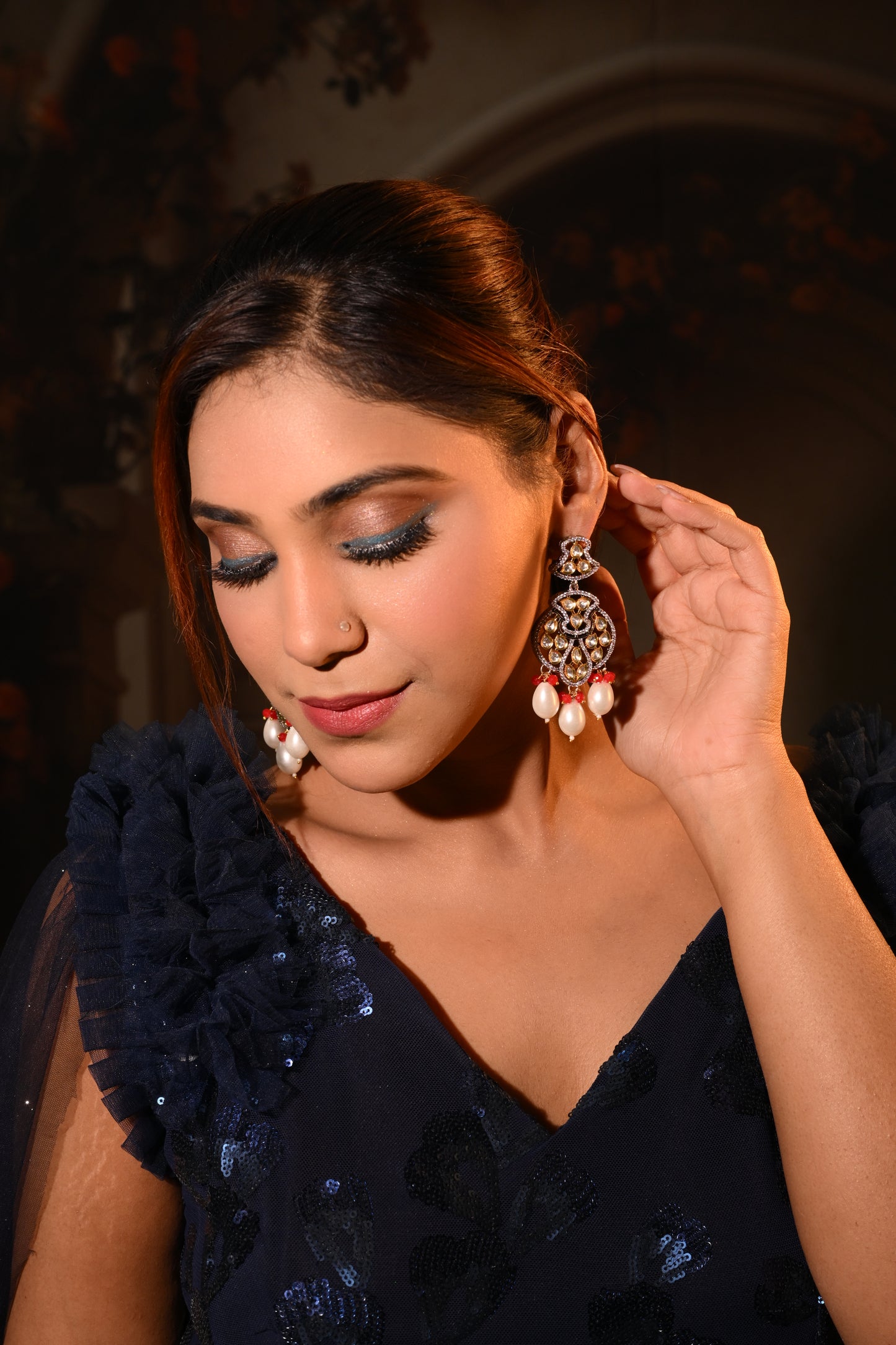 Opulent Kundan Chaandbali Earrings with Red Bead Accents