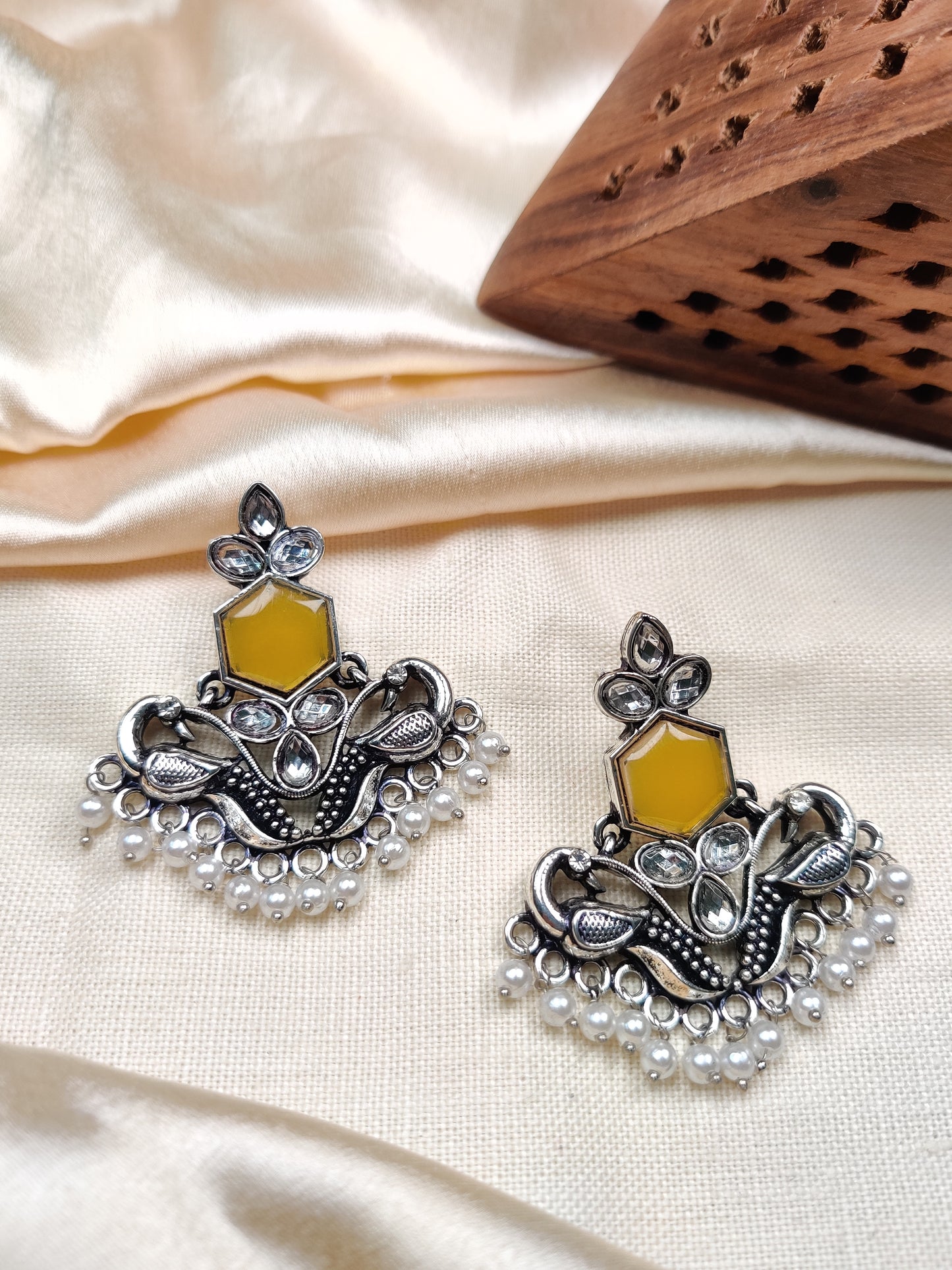 Silver peacock earrings with yellow stone & pearl beads