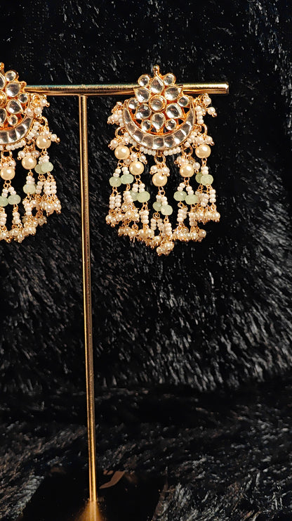 Floral Crescent Kundan Jhumka Earrings with Mint Green Beads & Pearl Tassels
