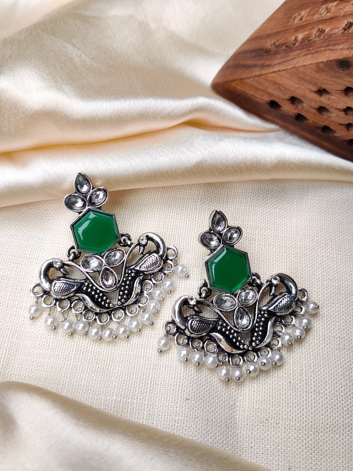 Silver peacock earrings with green stone & pearl beads
