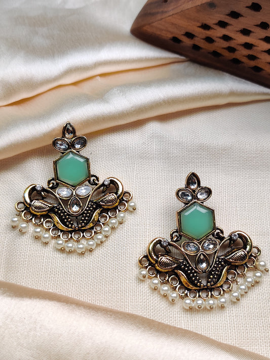 Golden peacock earrings with green stone & pearl drops