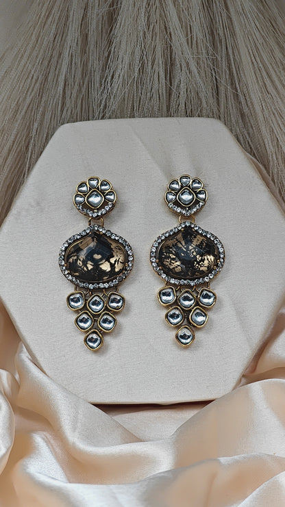 Luxury kundan studded earrings with black mirror stone
