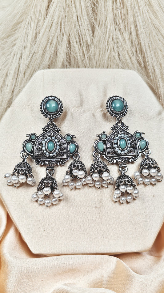Mint green stone oxidised silver long jhumka earrings