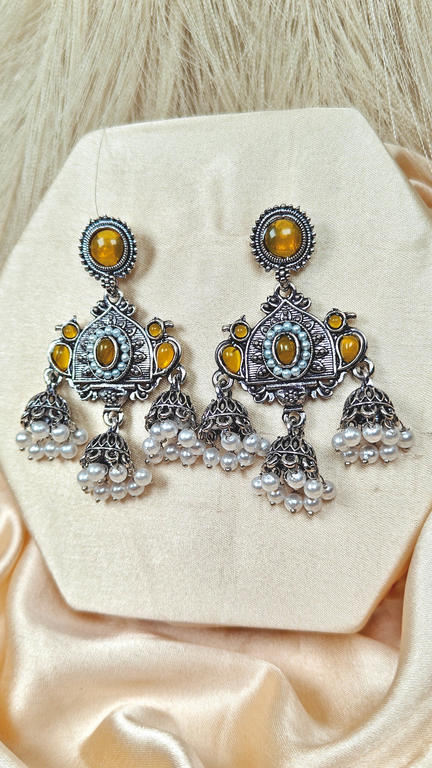 Yellow stone oxidised silver long jhumka earrings