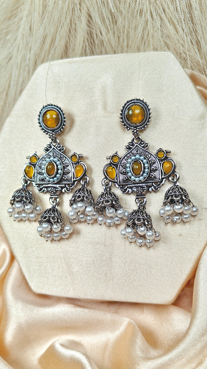 Yellow stone oxidised silver long jhumka earrings