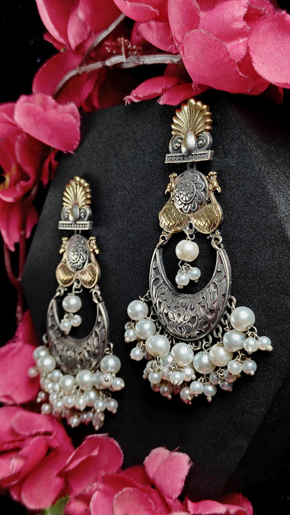 Antique Dual-Tone Peacock Jhumka Earrings With Pearl Clusters
